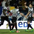 Angers' French midfielder Thomas Mangani (R) celebrates after scoring during the French Cup semi-final football match between Angers and Guingamp on April 25, 2017