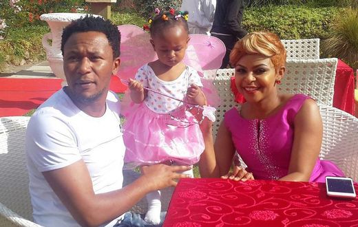 Ladasha and her parents during her party