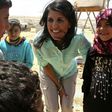 US Ambassador to the UN Nikki Haley talks to Syrian refugees during a visit to the Zaatari refugee camp on the Jordanian border with Syria on May 21, 2017