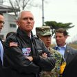 US Vice President Mike Pence (C) is expected to offer a renewed commitment to Japan's security amid a growing threat from a nuclear armed North Korea