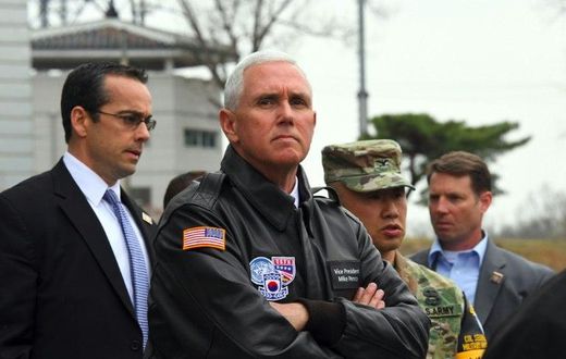 US Vice President Mike Pence (C) is expected to offer a renewed commitment to Japan's security amid a growing threat from a nuclear armed North Korea