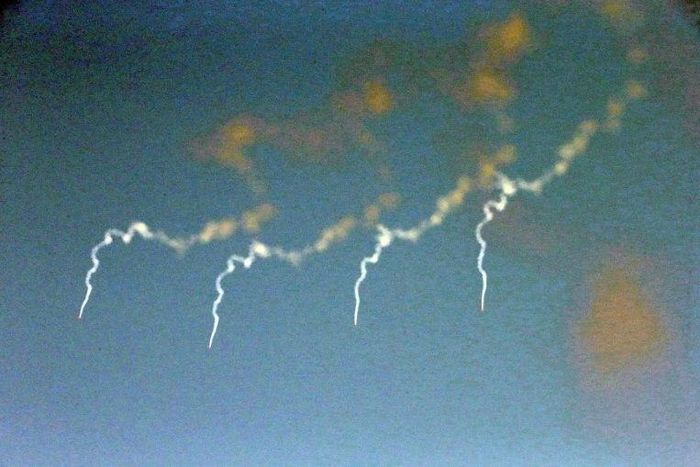 This undated picture released by North Korea's Korean Central News Agency (KCNA) via KNS on March 7, 2017 shows four ballistic missiles after they were fired by Korean People's Army (KPA) during a military drill at an undisclosed location