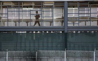 Crowded Plaza, Anxious Migrants and a Bolstered Wall