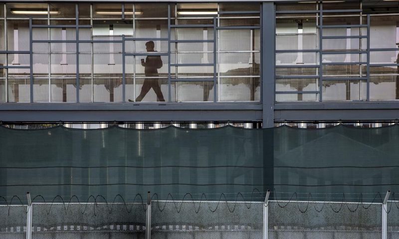 Crowded Plaza, Anxious Migrants and a Bolstered Wall