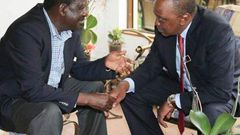 ODM leader Raila Odinga with President Uhuru Kenyatta.