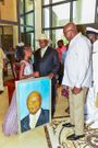 President Yoweri Museveni with Ms Sheila Sheldone Michaels who presented him with a portrait during his State visit to Mombasa, Kenya (Twitter)