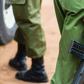 A Kenyan police officer holding a gun (Courtesy)