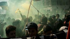 Students march to demand the government to speed up a long-awaited reform to guarantee universal access to free public education, in Santiago on April 11, 2017