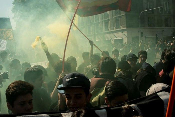 Students march to demand the government to speed up a long-awaited reform to guarantee universal access to free public education, in Santiago on April 11, 2017