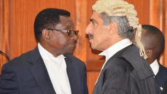 Queen's Counsel Khawar Qureshi with Senior Counsel James Orengo in Court