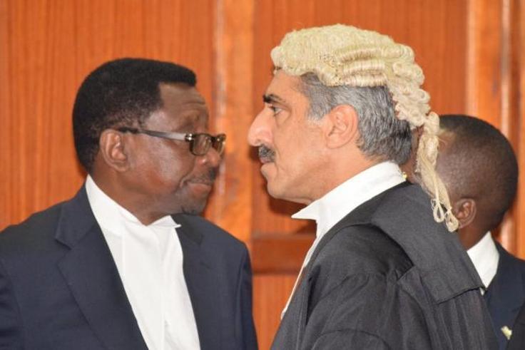 Queen's Counsel Khawar Qureshi with Senior Counsel James Orengo in Court