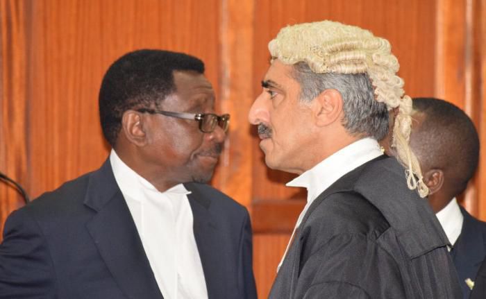 Queen's Counsel Khawar Qureshi with Senior Counsel James Orengo in Court