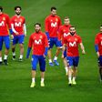 Spain's defender Sergio Ramos (C) and his teammates take part in a training session at the Stade de France stadium in Saint-Denis, north of Paris, on March 27, 2017 on the eve of the friendly football match Spain against France
