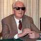 Formula One legend Enzo Ferrari, pictured in March 1987, is buried in a cemetery in Modena behind a plate of marble in a large chapel secured by a heavy iron gate