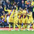 Crystal Palace's striker Christian Benteke (L) celebrates scoring a goal against Liverpool with Joel Ward (2ndL), James Tomkins (2ndR) and Jason Puncheon on April 23, 2017