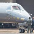 Eduardo Cunha was photographed being led to an airplane in the capital Brasilia under the eye of several guards, including a so-called 'hipster cop' which has caught the attention of Brazilian media