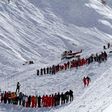 Rescuers work in an off-piste area after an avalanche engulfed nine people, killing at least four, in Tignes, in the French Alps, in a picture made available by Radio Val d'Isere on Febuary 13, 2017