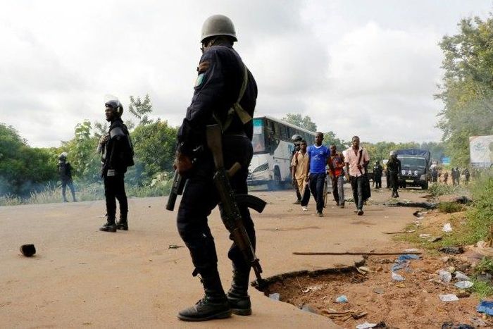 Four people were killed when police clashed May 23 with former rebels who had blocked the road into Bouake, Ivory Coast's second biggest city, to demand government compensation payments
