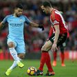 Manchester City's striker Sergio Aguero (L) vies with Sunderland's defender John O'Shea during the English Premier League football match between Sunderland and Manchester City at the Stadium of Light in Sunderland, north-east England on March 5, 2017