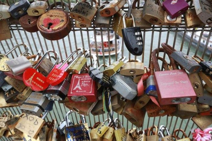 The trend for leaving 'love locks' on Paris bridges eventually became an eyesore and a danger