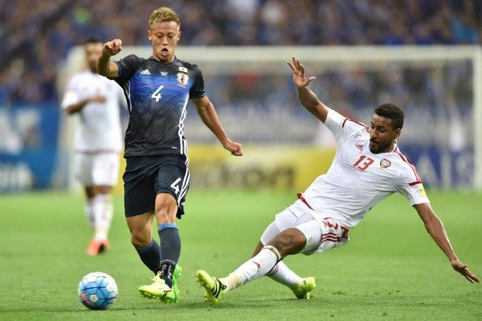 Keisuke Honda (L)blames his own shortcomings for a debate about his future in Japan's national squad
