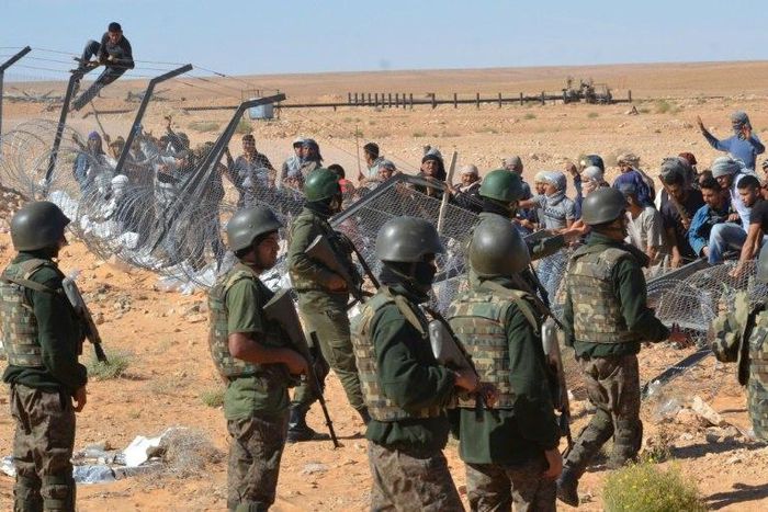 Tunisian protesters confront security forces outside the El Kamour oil and gas pumping station on May 22, 2017