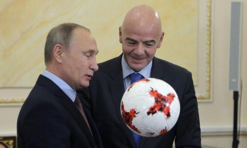 Russian President Vladimir Putin chats with FIFA president Gianni Infantino at the Kremlin in Moscow, on November 25, 2016