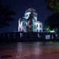 A pedestrian walks past the Hiroshima Peace Memorial Genbaku Dome on May 24, 2016