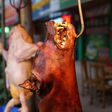A roasted dog hangs outside a restaurant in Yulin, in China's southern Guangxi region