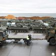 British tanks and military vehicles are unloaded at the port Estonian of Paldiski on March 22, 2017