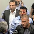 Opposition Social Democrats leader Zoran Zaev bleeding after being injured when supporters of Macedonia's former leading party entered the parliament and attacked MPs
