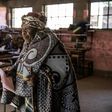A woman votes during Lesotho's June general election, the landlocked kingdom's second snap poll in three years