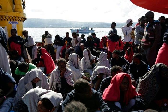 Migrants arrive in Vibo Marina, after a rescue operation in the Mediterranean Sea during which nine people drowned, ten were missing and nearly 1000 were rescued