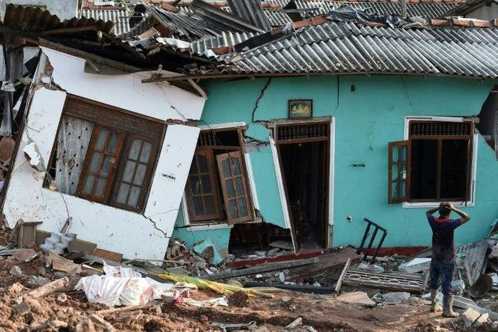 Some 145 homes were destroyed when the 300-foot (90-metre) rubbish mountain came crashing down and police say many more buildings were damaged and could collapse at any time.