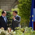 French President Francois Hollande (L), seen with now-presidential candidate Emmanuel Macron in 2015, said of possible campaign hacks, "We knew that there were these risks during the presidential campaign because it happened elsewhere"