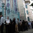 Iranians queue to vote in an election seen as a verdict on the rule of President Hassan Rouhan