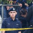 Heavy security for the accused Siti Aisyah (C) and Doan Thi Huong (not pictured) at the pre-trial hearing in Malaysia into the murder of Kim Jong-Nam