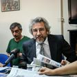 Cumhuriyet Daily newspaper Editor-in-chief Can Dundar (C), pictured during a meeting in 2016, was handed a five-year-and-10-month jail term and has now fled Turkey for Germany