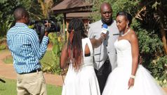 Members of the press interview Dennis and Betty (Courtesy)