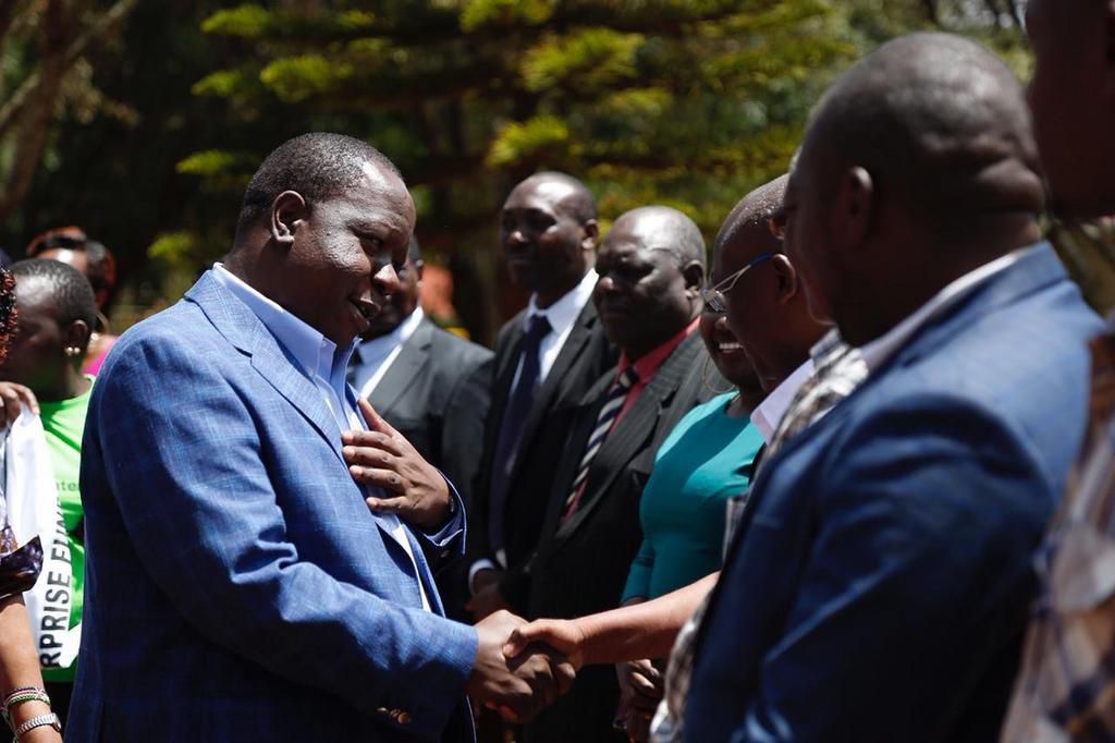 Interior CS Fred Matiang'i interacts with local leaders during a Friday event in Meru County (Twitter)