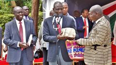File image of DP Ruto donating cash at a past harambee