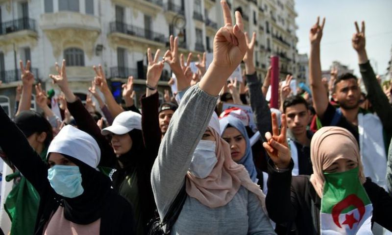 Algerian students protest against the "system" in the capital Algiers on April 23, 2019