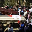 Thousands of indigenous Guatemalans accompany to the cemetery the coffins of two children killed by their kidnappers in the Cerro Alto village in San Juan Sacatepequez, 45km west of Guatemala city on February 14, 2017