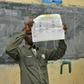 Officials count ballots at a polling station in Bamako on November 20, 2016