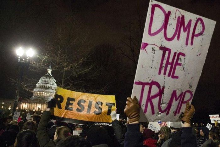 Demonstrators protest against US President Donald Trump and his administration's travel ban outside the US Supreme Court in Washington, DC, on January 30, 2017