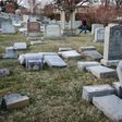 Vandalized tombstones are seen at the Jewish Mount Carmel Cemetery, February 26, 2017, in Philadelphia, PA