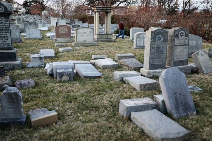 Vandalized tombstones are seen at the Jewish Mount Carmel Cemetery, February 26, 2017, in Philadelphia, PA