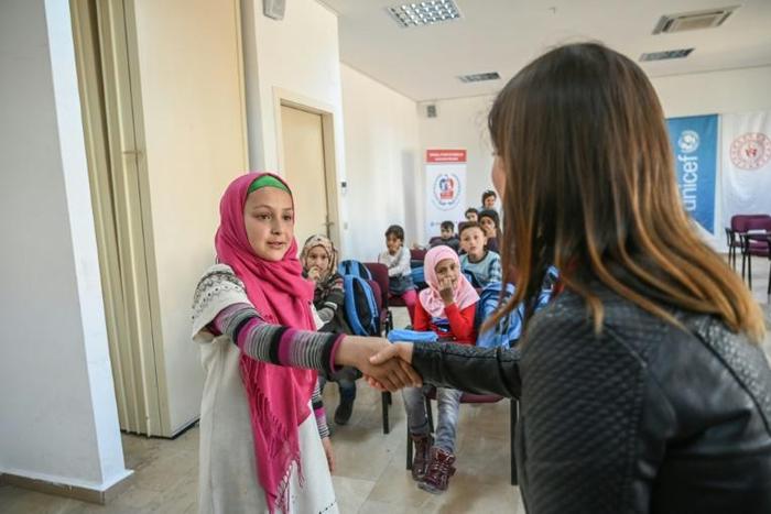 Fatmeh is one of 460,000 refugees in Turkey -- most of them Syrian -- whose family benefits from monthly supplements aimed at keeping school-age children in class rather than out working