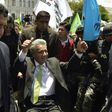 Ecuador's President-elect Lenin Moreno (C) greets supporters at the Plaza Grande in Quito on April 3, 2017