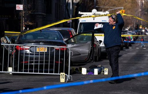 Pinned between cars, officer shoots a driver near Bronx court, police say